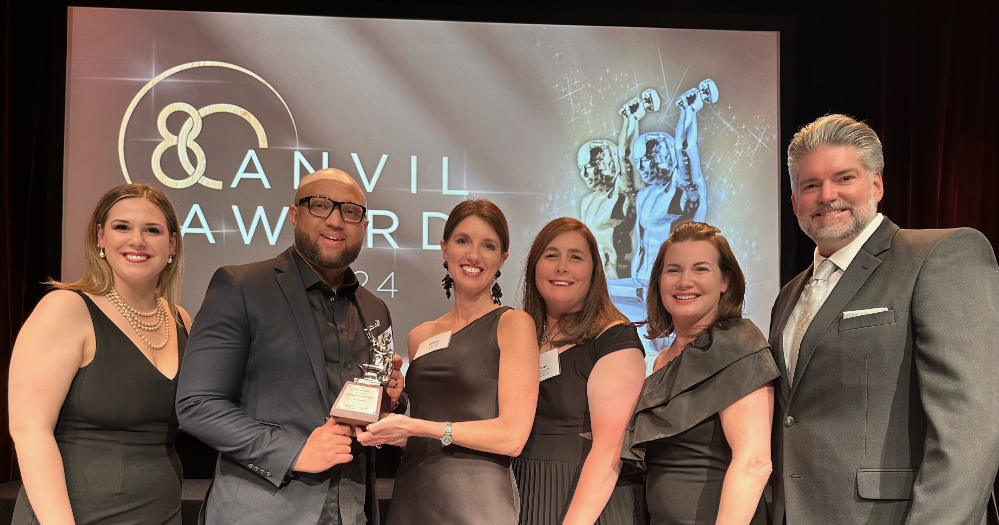 Baptist Health and Stone Ward accept the Silver Anvil in Integrated Communications